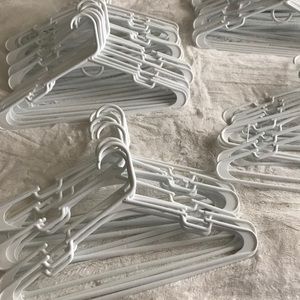 80 White plastic hangers